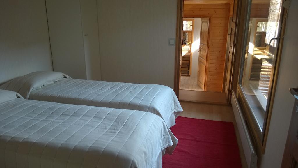 Kuoreksenniemi Villas & Lakehouse Пуумала Стая снимка